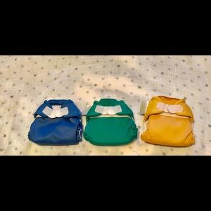 Reserved - lot of 3 newborn bumgenius diapers